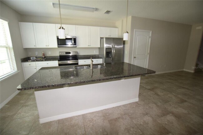 Building Photo - 16097 Pebble Blf Lp