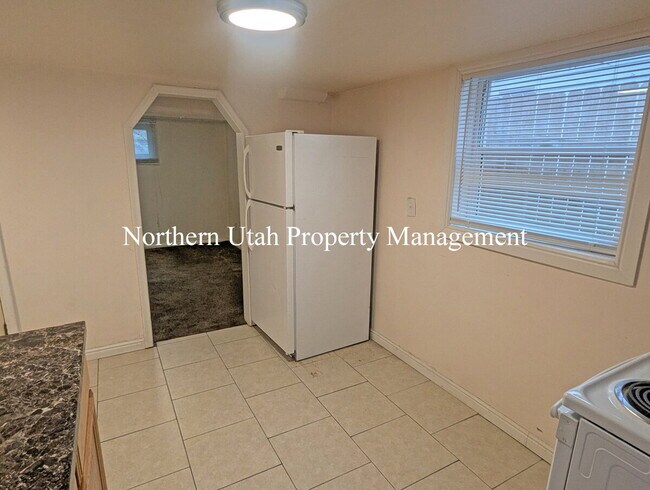 Building Photo - Lower Level Studio Unit