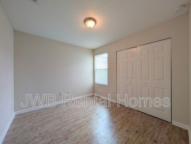Building Photo - 8445 McGirts Village Ln