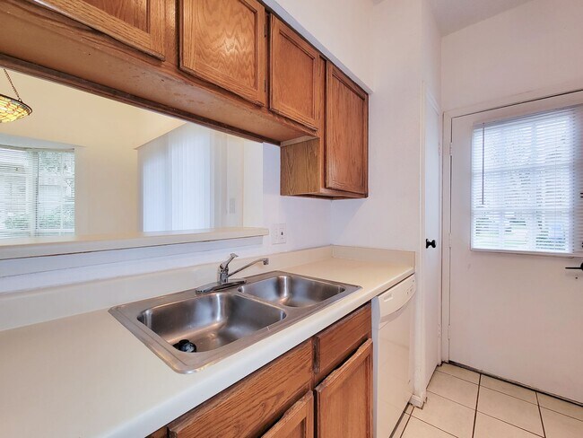 Building Photo - Beautiful two-story corner unit filled with natural light!