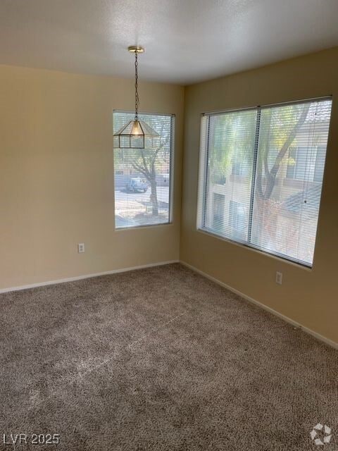 Building Photo - 5710 E Tropicana Ave