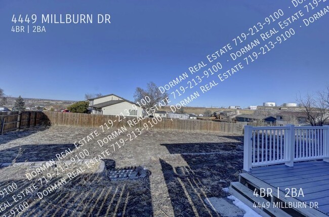 Building Photo - Four bedroom home close to Ft. Carson, Lar...