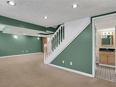 Basement that can be used as a 5th bedroom with full third bath. - 5101 Boulevard Pl