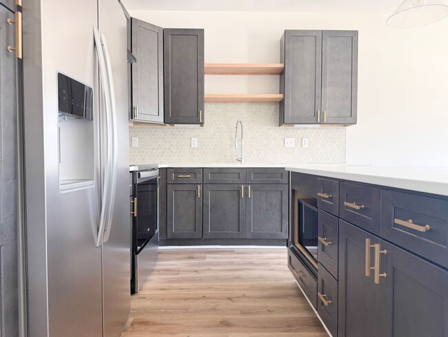 Building Photo - Fuller Style - Spacious 2-Bedroom Townhome with Flex Room at Highbury