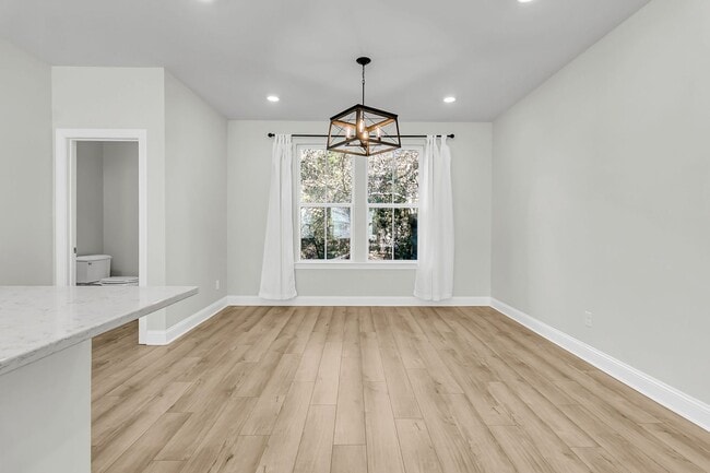 Building Photo - Gorgeous 3-Story Townhome in Park Circle | 3BR + Flex Space + Garage