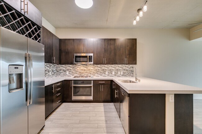 Building Photo - Modern High-Rise Living at Juhl with City Views