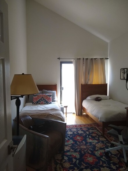 second bedroom with balcony and vaulted ceiling - 14572 Dickens St