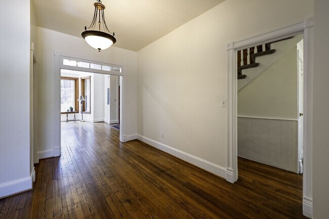 Building Photo - Historic & Charming 3BR Rowhouse near Howard is Move-in Ready!