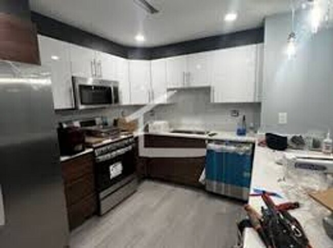 Building Photo - New Apartment on Washington Sq. In-Unit Washer and Dryer, Central Heat/AC, Steps from the T Stop