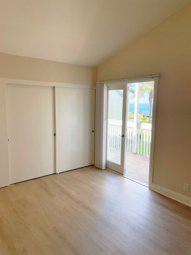 Building Photo - Bright  Upstairs Two Bedroom Condo at Strands Beach with Ocean View