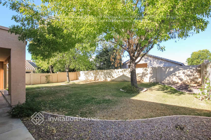 Building Photo - 8228 W Harmony Ln