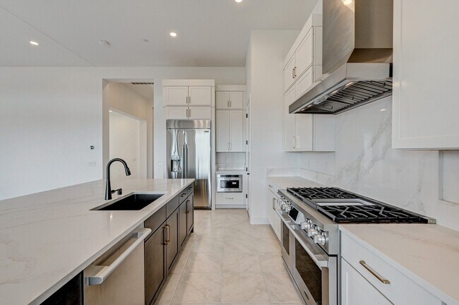 Building Photo - Experience elevated living at Guard Gated ...