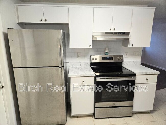 Building Photo - 6111 1st Ave