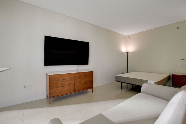 Building Photo - Stunning Strip Views from this Fully Furnished Studio Residence.