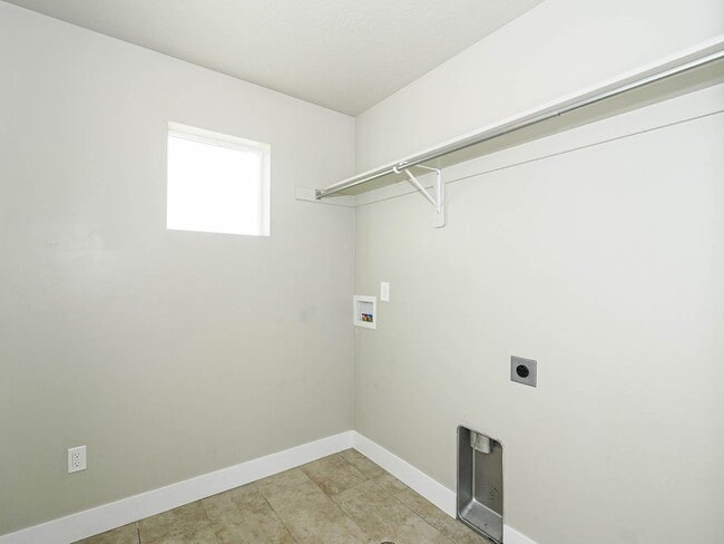 Building Photo - 4-bedroom, 2.5 bathroom Home