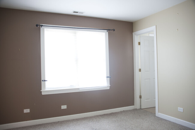 Master bedroom with en-suite bathroom. - 2112 North Karlov Avenue