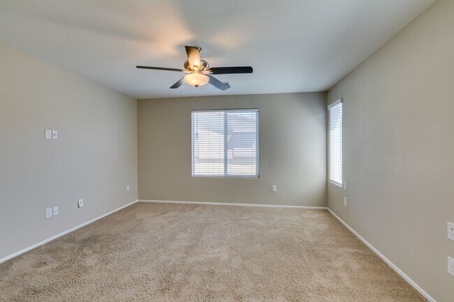 Building Photo - Spacious Townhouse with Loft & Rare 3-Car Garage!