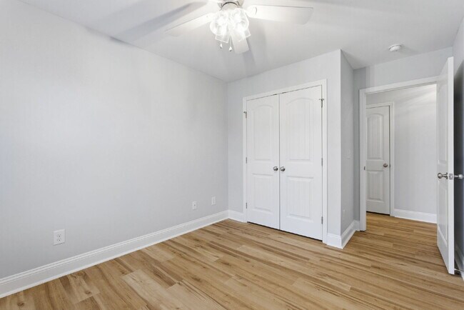 Building Photo - Now available, freshly painted with a community pool!