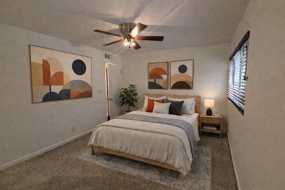 Spacious primary suite with mirrored closets, new carpet, and ensuite bath - 970 Palm Avenue