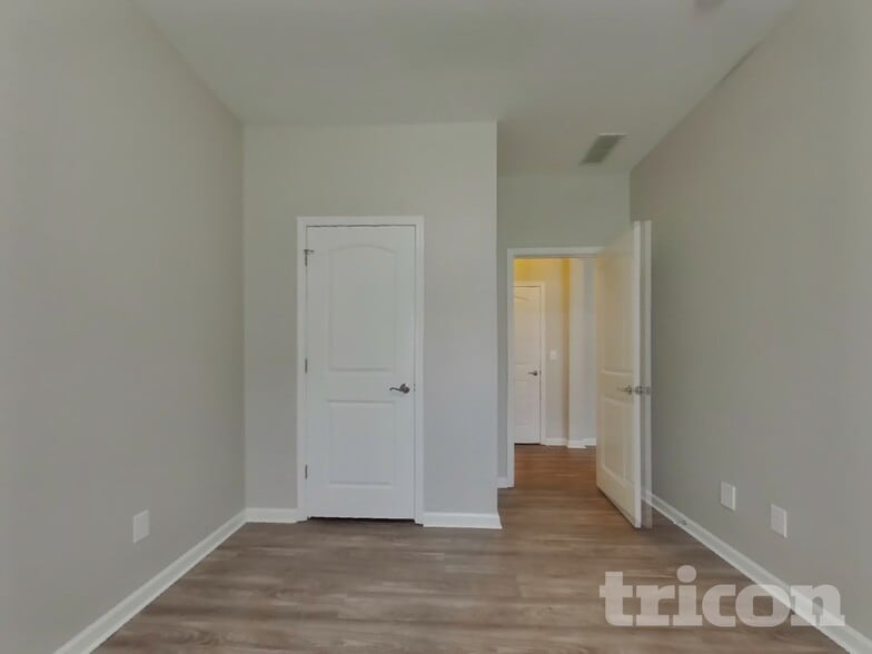 Building Photo - 6909 Barefoot Forest Dr