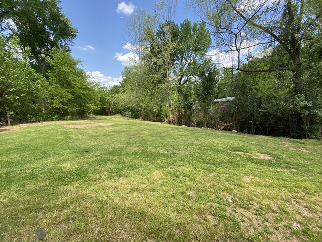 Private partially fenced in backyard, next to creek - 1851 Darbrook Dr