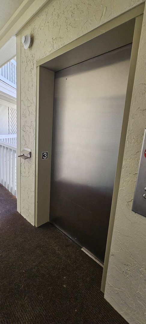 Building Photo - Dreamy Little River Condo — Furnished, Elevator Access, Pool & Marina Nearby!