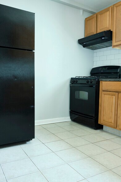 Kitchen with Stove and Fridge - 201 Locust St