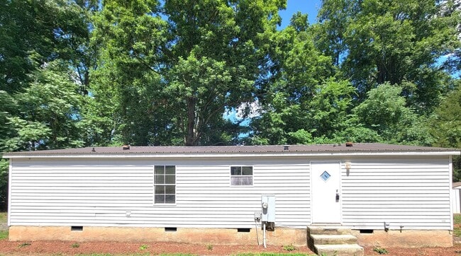 Building Photo - Charming and Peaceful Private Home with Granite Countertops & Wooded Views