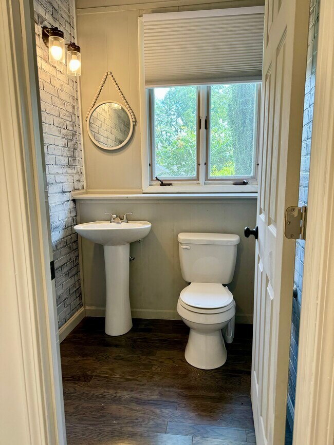 Half bathroom in flex space - 6111 Northlakes Dr