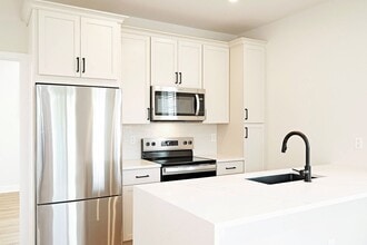 Building Photo - Light-Filled Belmont Apartment With Oversized Garage