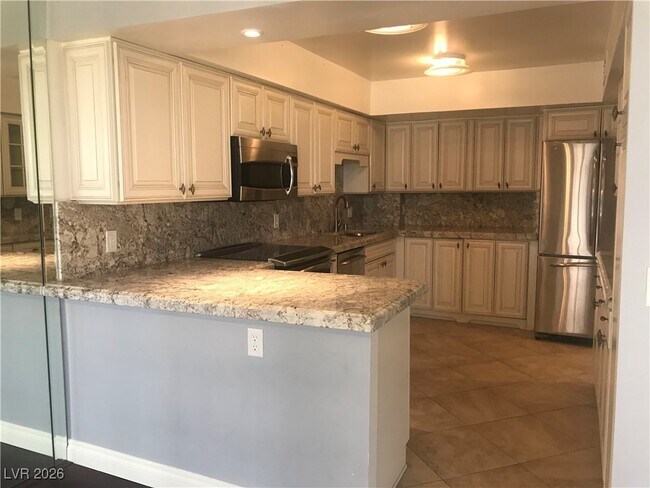 Building Photo - 205 E Harmon Ave