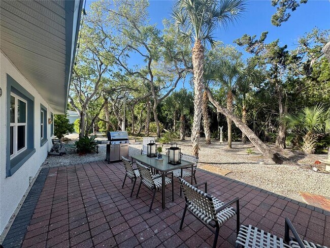 Building Photo - 7372 Melaleuca Way