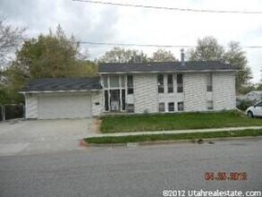 Building Photo - Great home with 2 car garage, deck and shed, fenced yard in Roy for rent
