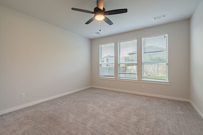 Building Photo - Spacious Buda Beauty Offering Open-Concept Living and Flexible Space for Every Lifestyle!