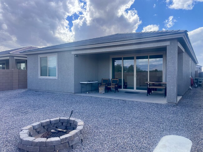 Rear of house with covered porch - 11797 E Becker Dr