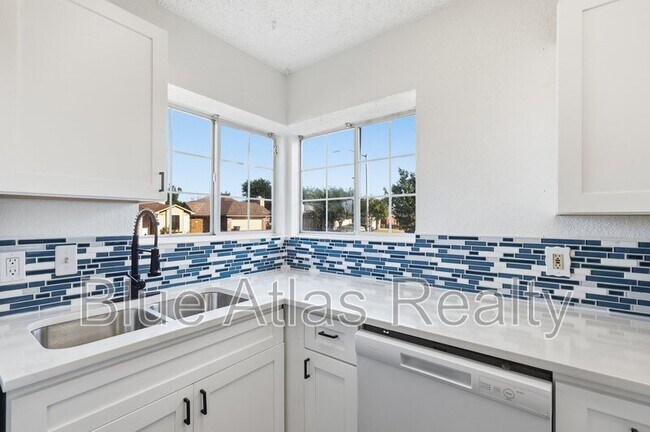 Building Photo - 7124 Wagonwheel Rd