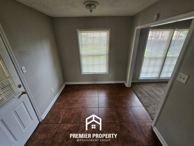 Building Photo - Quiet Cove Living in 38115 | 3BR/2BA with Brick Fireplace & Fenced Yard