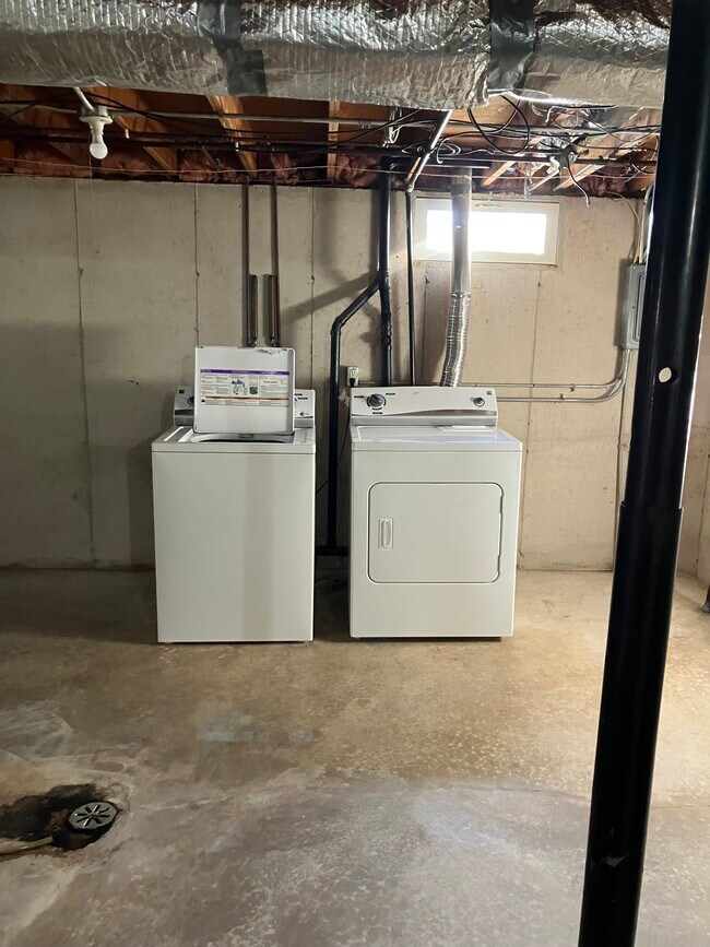 Washer and dryer in the basement. - 1525 Commanche Ave