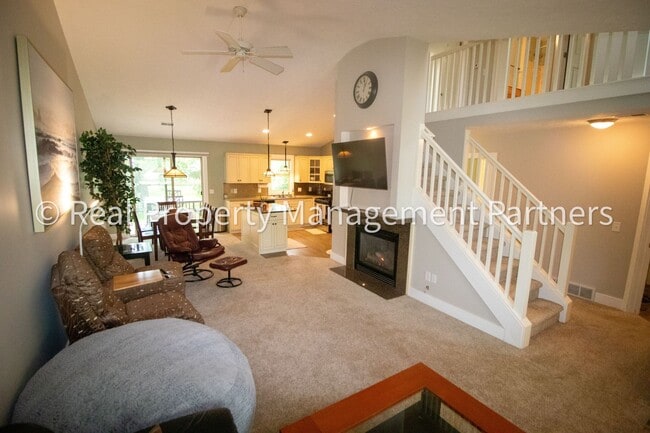 Building Photo - Spacious 3BR Townhome in Lowell | Nature Views & Maintenance-Free Living