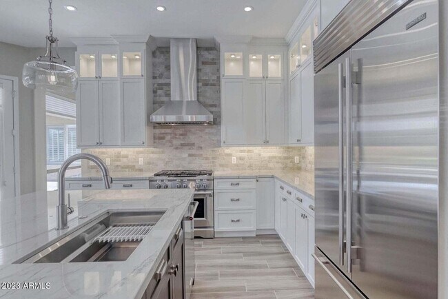 Building Photo - 7553 E Buteo Dr