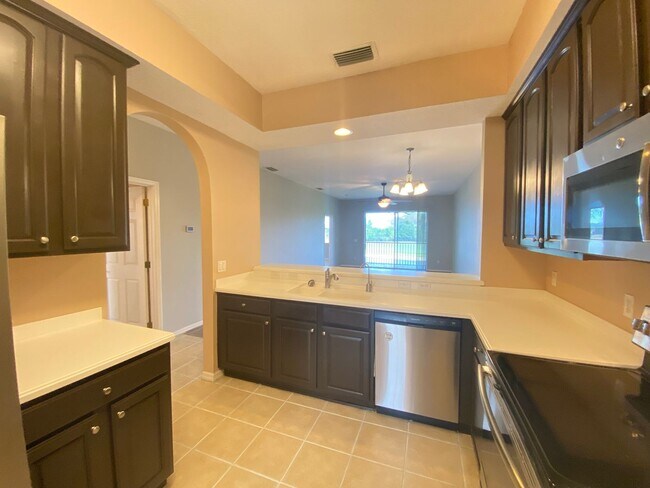 Building Photo - Beautiful 2/2 Condo in North Shore at Lake Hart – Golf Course Views & Available Now!