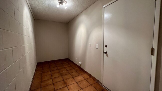 Building Photo - Freshly Updated 2-Bedroom Condo with Attached Garage in Gated Winnetka Community