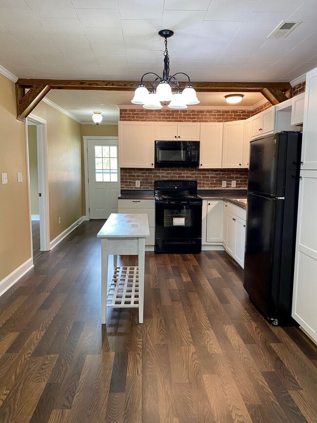 Building Photo - Amazing property! Dreamy wraparound porch! Immaculate & Completely Updated! 3 Bedrooms/2 Baths!