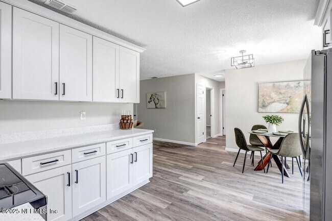 Building Photo - Waterfront 3 BR 2 BA Remodeled Rental Home