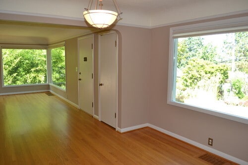 The house has an open floor plan with the kitchen, dining and living areas all flowing together. - 9121 SW 35th Ave