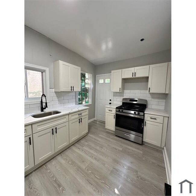 Primary Photo - 3 Bedroom with Basement