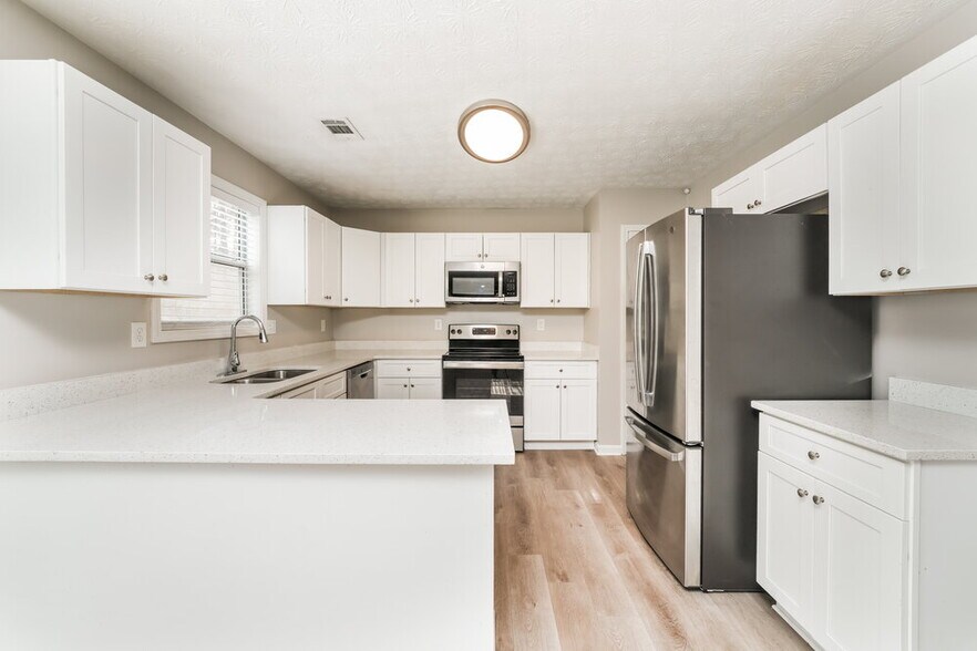 Building Photo - 6551 Lauren's Way