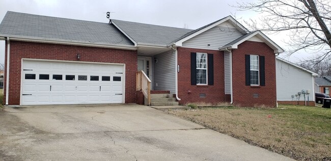 Building Photo - Close to Post! No Carpet! Lovely 3 Bed/2 Bath fenced in backyard!