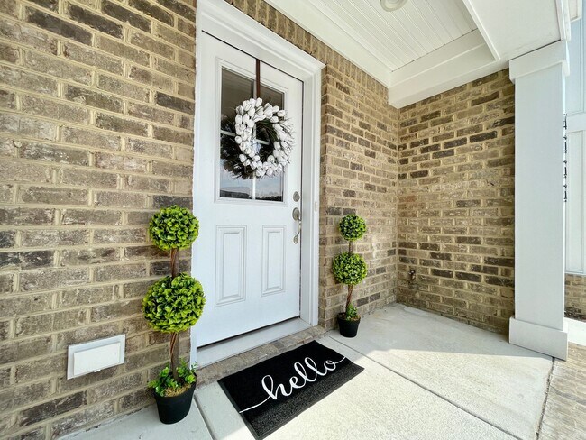 Building Photo - Practically New & Available NOW! Americana...