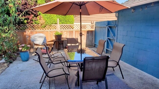 Building Photo - Bright Four-Bedroom Home with Spacious Outdoor Area